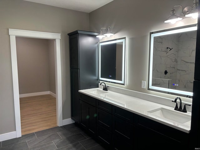 bathroom featuring hardwood / wood-style floors and vanity