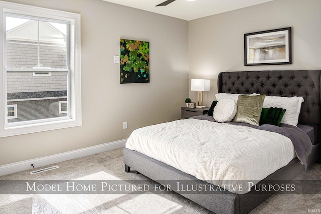 bedroom with carpet flooring and ceiling fan