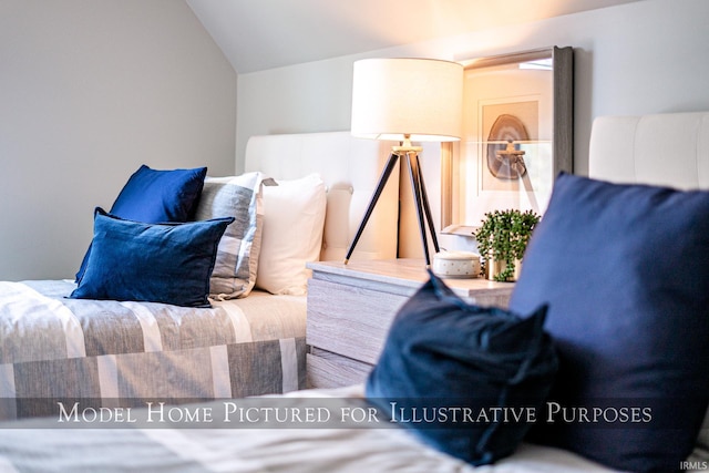 sitting room featuring lofted ceiling