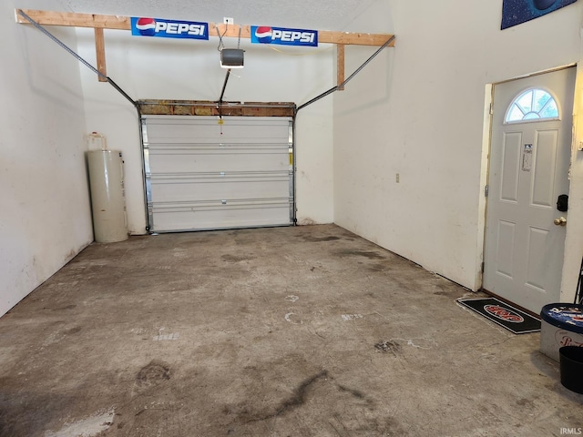 garage featuring a garage door opener and water heater