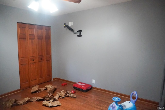 interior space featuring ceiling fan and hardwood / wood-style flooring