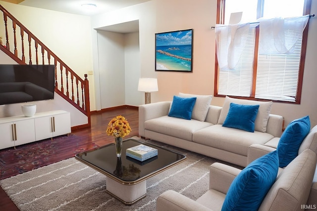 living room featuring dark hardwood / wood-style floors