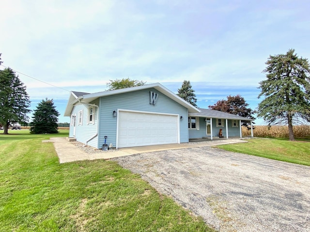 view of front facade with a garage and a front yard