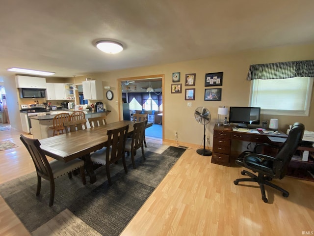 dining area featuring light hardwood / wood-style flooring