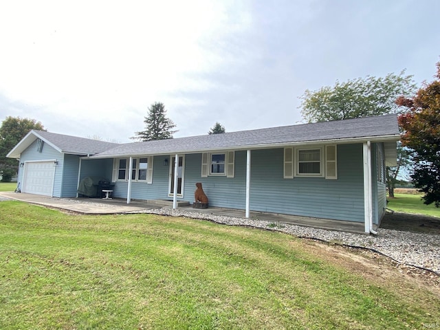 ranch-style home featuring a front yard, a porch, and a garage