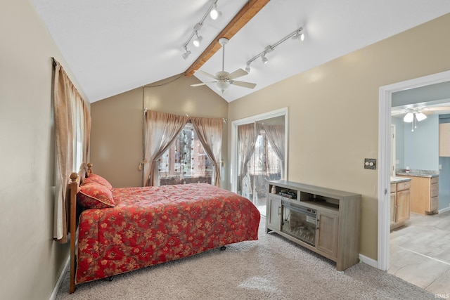 bedroom with ceiling fan, light colored carpet, ensuite bath, and lofted ceiling with beams