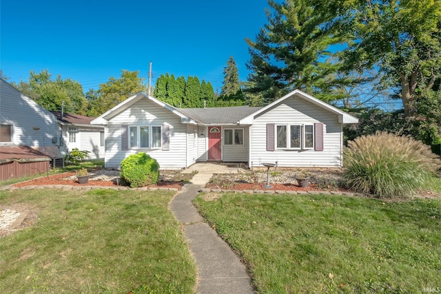 view of front of house with a front lawn