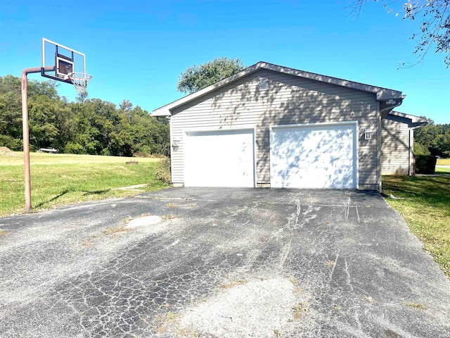 garage with a yard