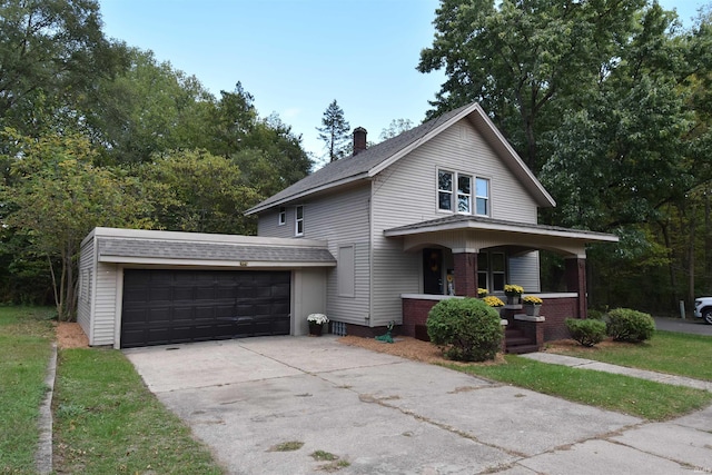 view of front facade with a porch and a garage