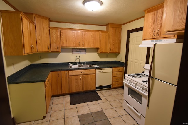 kitchen with white appliances, light tile patterned floors, a textured ceiling, crown molding, and sink