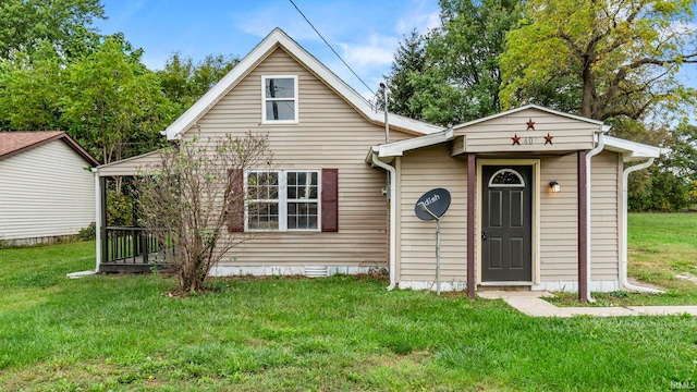 view of front of home with a front lawn