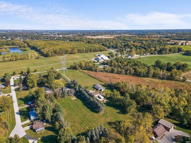 birds eye view of property with a water view and a rural view