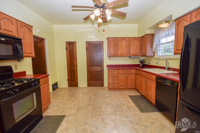 kitchen with black appliances, ceiling fan, and sink