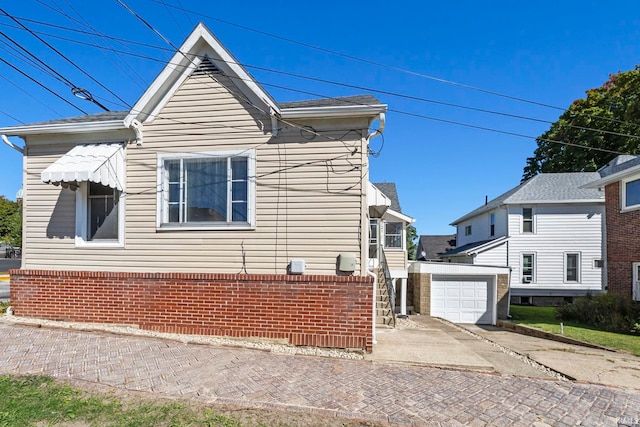 view of home's exterior with a garage