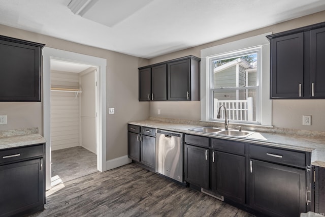 kitchen with dishwasher, dark wood-type flooring, and sink