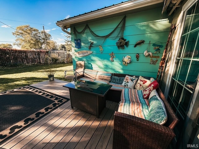 deck with a lawn and outdoor lounge area