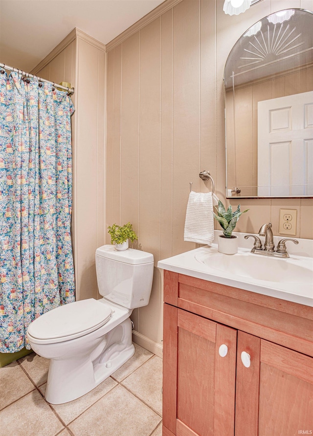 bathroom with vanity, tile patterned flooring, toilet, and ornamental molding