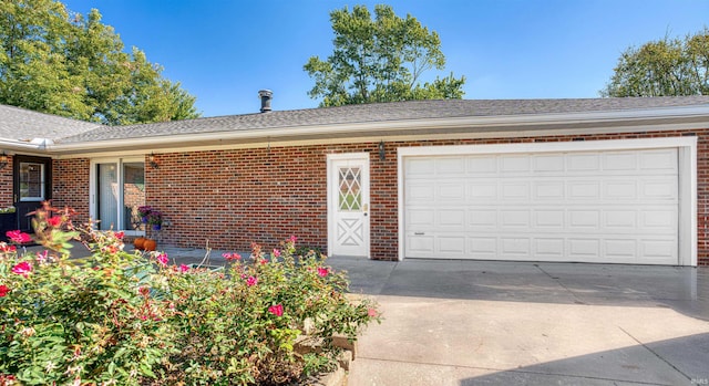 single story home featuring a garage