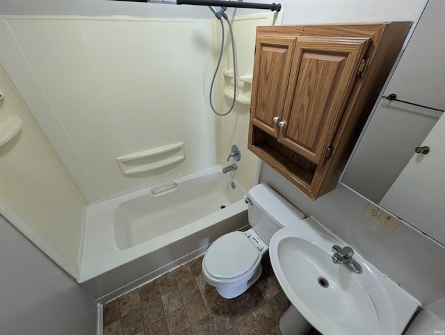 full bathroom featuring shower / bathing tub combination, sink, and toilet