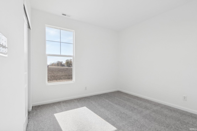 view of carpeted spare room