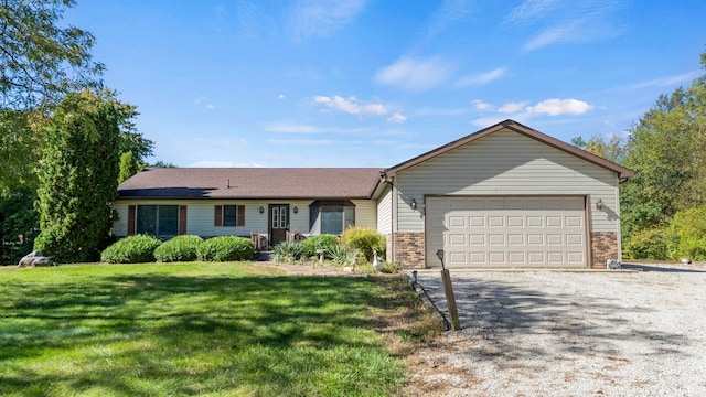 single story home featuring a garage and a front yard