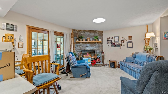 carpeted living room with a fireplace