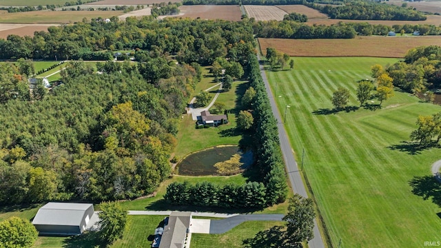 birds eye view of property featuring a rural view