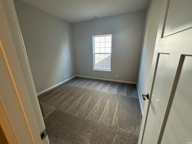 empty room featuring carpet