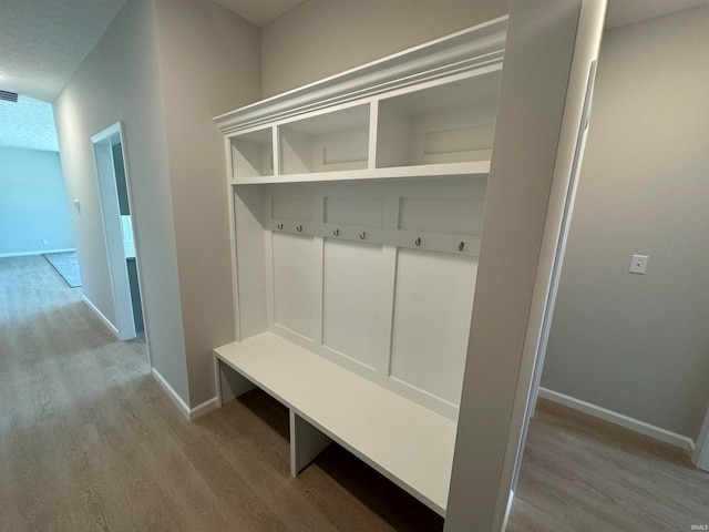 mudroom featuring wood-type flooring