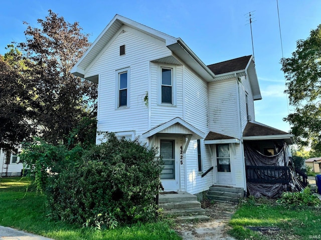 view of front of property with entry steps