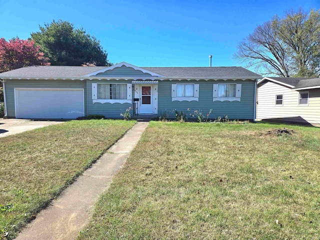 ranch-style home with a front lawn and a garage