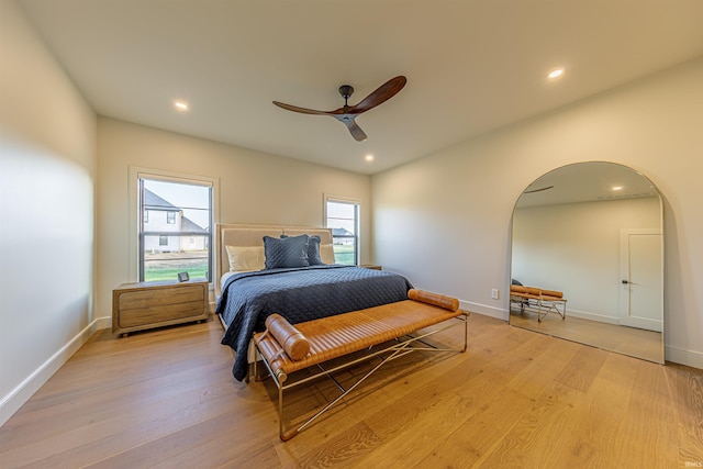2065 Chadwick Dr, Newburgh, IN 47630 - bedroom with arched walkways, light wood-type flooring, recessed lighting, and a ceiling fan