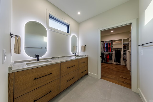 bathroom featuring wood-type flooring and vanity