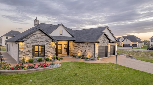 2065 Chadwick Dr, Newburgh, IN 47630 - view of front of home with stone siding, concrete driveway, a shingled roof, a chimney, and a front yard