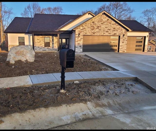 view of front of property with a garage