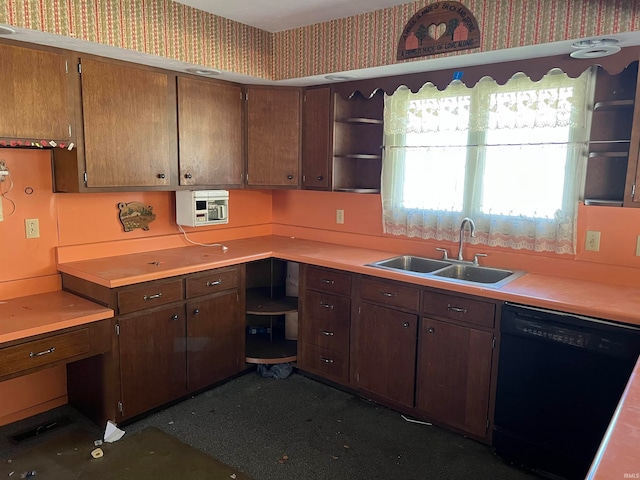 kitchen featuring black dishwasher and sink