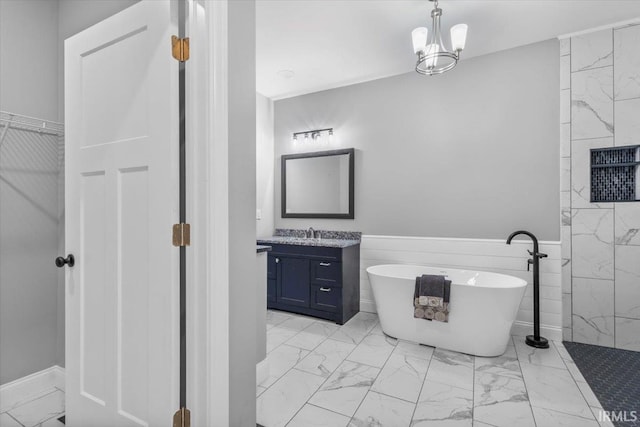 bathroom with tile walls, vanity, an inviting chandelier, and shower with separate bathtub