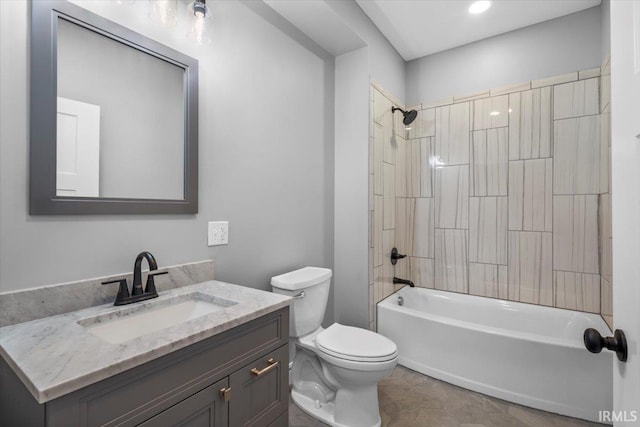 full bathroom featuring bathing tub / shower combination, vanity, and toilet