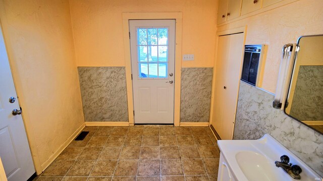 bathroom featuring tile patterned flooring, an enclosed shower, vanity, and toilet