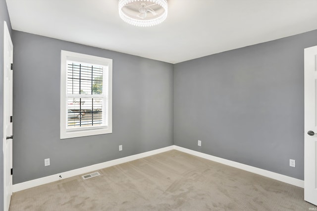 view of carpeted spare room