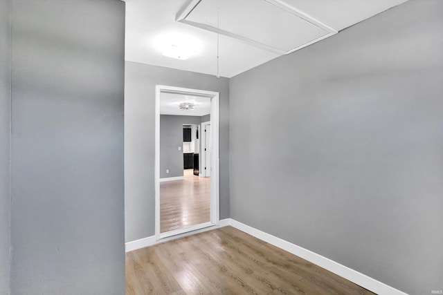 hall with light hardwood / wood-style floors