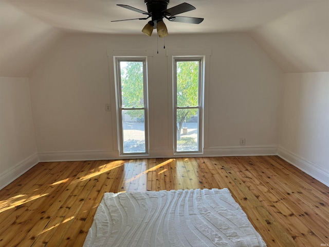 bonus room featuring ceiling fan, light hardwood / wood-style flooring, and vaulted ceiling