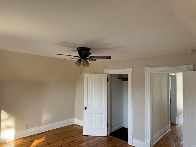 bonus room featuring dark hardwood / wood-style flooring and ceiling fan