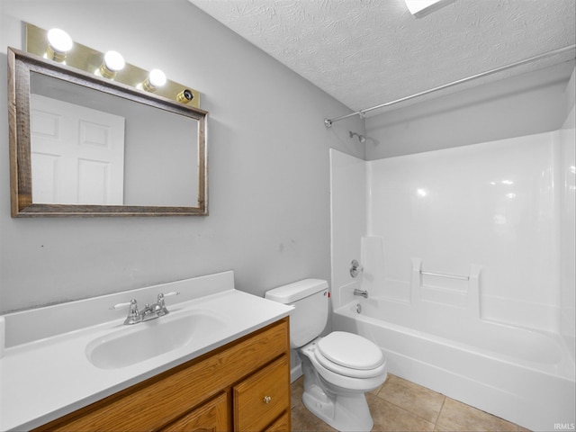 full bathroom featuring tile patterned flooring, toilet, shower / bathtub combination, vanity, and a textured ceiling