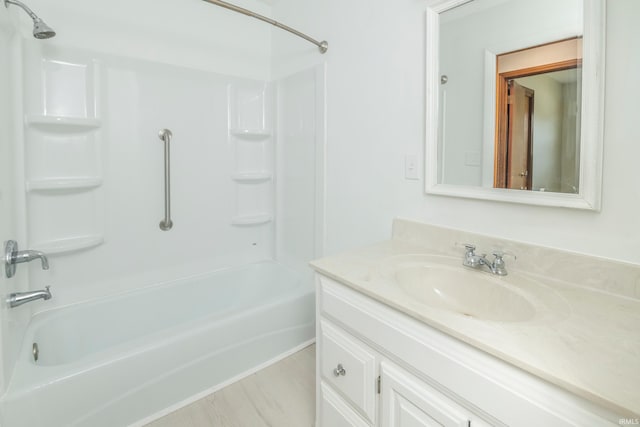 bathroom featuring shower / bathing tub combination and vanity