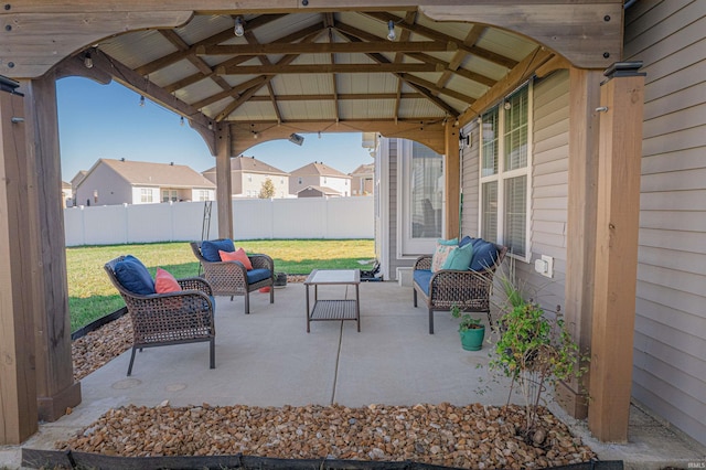 view of patio featuring a gazebo and an outdoor living space