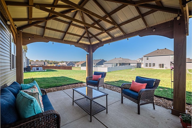 view of patio featuring an outdoor living space and a gazebo