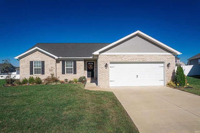 ranch-style house with a garage and a front yard