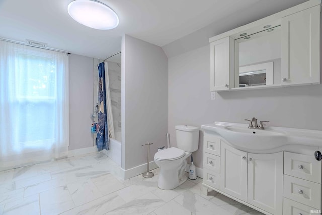 full bathroom featuring shower / tub combo, vaulted ceiling, vanity, and toilet