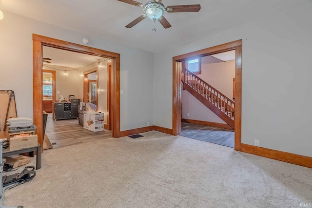 interior space with plenty of natural light and ceiling fan